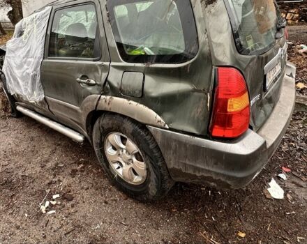 Зеленый Мазда Трибьют, объемом двигателя 3 л и пробегом 219 тыс. км за 2000 $, фото 1 на Automoto.ua