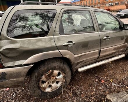 Зеленый Мазда Трибьют, объемом двигателя 3 л и пробегом 219 тыс. км за 2000 $, фото 2 на Automoto.ua