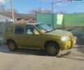 Зелений Мазда Трибьют, об'ємом двигуна 2 л та пробігом 180 тис. км за 3800 $, фото 1 на Automoto.ua