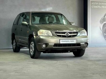 Зеленый Мазда Трибьют, объемом двигателя 2 л и пробегом 358 тыс. км за 3800 $, фото 1 на Automoto.ua