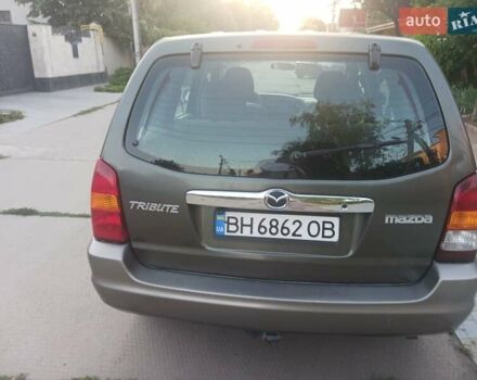 Зеленый Мазда Трибьют, объемом двигателя 2 л и пробегом 320 тыс. км за 4800 $, фото 1 на Automoto.ua