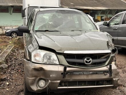 Зеленый Мазда Трибьют, объемом двигателя 3 л и пробегом 219 тыс. км за 2000 $, фото 1 на Automoto.ua