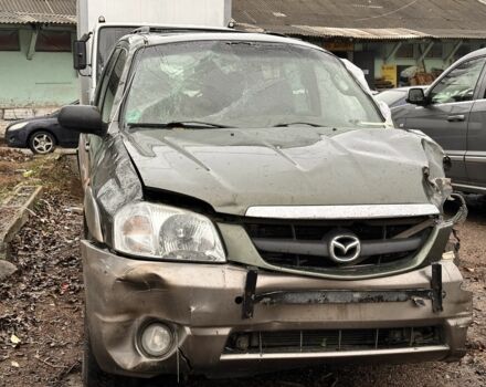 Зеленый Мазда Трибьют, объемом двигателя 3 л и пробегом 219 тыс. км за 2000 $, фото 1 на Automoto.ua