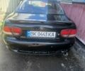 Черный Мазда Кседос 6, объемом двигателя 2 л и пробегом 420 тыс. км за 443 $, фото 1 на Automoto.ua