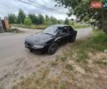 Черный Мазда Кседос 6, объемом двигателя 2 л и пробегом 420 тыс. км за 2100 $, фото 1 на Automoto.ua