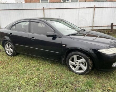 Чорний Мазда Кседос 6, об'ємом двигуна 2 л та пробігом 340 тис. км за 2999 $, фото 4 на Automoto.ua