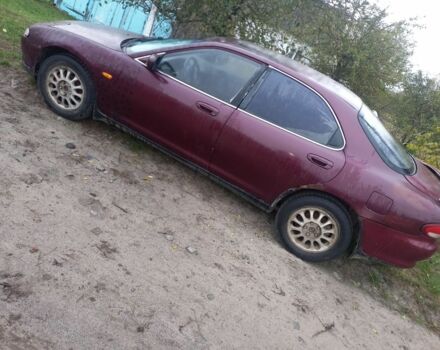 Красный Мазда Кседос 6, объемом двигателя 2 л и пробегом 300 тыс. км за 900 $, фото 5 на Automoto.ua