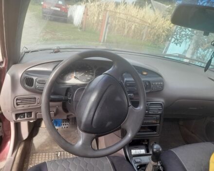 Красный Мазда Кседос 6, объемом двигателя 2 л и пробегом 300 тыс. км за 900 $, фото 1 на Automoto.ua