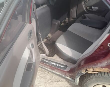 Красный Мазда Кседос 6, объемом двигателя 2 л и пробегом 300 тыс. км за 900 $, фото 2 на Automoto.ua