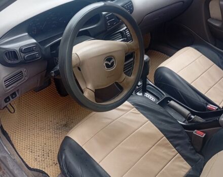 Красный Мазда Кседос 6, объемом двигателя 2 л и пробегом 340 тыс. км за 2000 $, фото 7 на Automoto.ua
