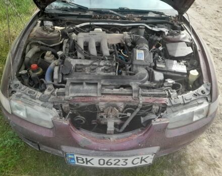 Красный Мазда Кседос 6, объемом двигателя 2 л и пробегом 300 тыс. км за 900 $, фото 3 на Automoto.ua