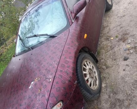 Красный Мазда Кседос 6, объемом двигателя 2 л и пробегом 300 тыс. км за 900 $, фото 4 на Automoto.ua