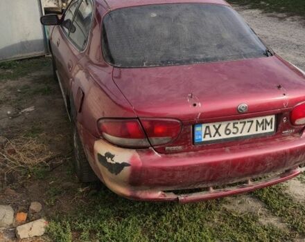 Червоний Мазда Кседос 6, об'ємом двигуна 2 л та пробігом 424 тис. км за 700 $, фото 4 на Automoto.ua