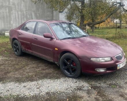 Красный Мазда Кседос 6, объемом двигателя 2 л и пробегом 350 тыс. км за 1200 $, фото 1 на Automoto.ua