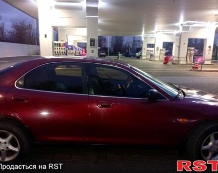 Красный Мазда Кседос 6, объемом двигателя 1.6 л и пробегом 265 тыс. км за 2500 $, фото 3 на Automoto.ua