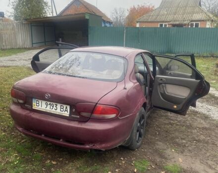 Красный Мазда Кседос 6, объемом двигателя 2 л и пробегом 350 тыс. км за 1200 $, фото 3 на Automoto.ua