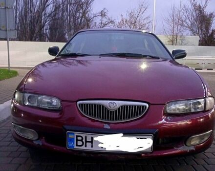 Красный Мазда Кседос 6, объемом двигателя 1.6 л и пробегом 265 тыс. км за 2500 $, фото 4 на Automoto.ua