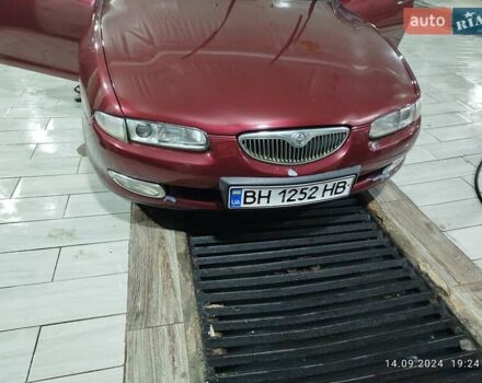 Червоний Мазда Кседос 6, об'ємом двигуна 1.6 л та пробігом 265 тис. км за 2500 $, фото 3 на Automoto.ua