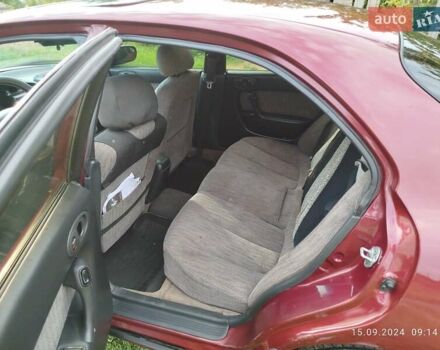 Червоний Мазда Кседос 6, об'ємом двигуна 1.6 л та пробігом 265 тис. км за 2500 $, фото 7 на Automoto.ua