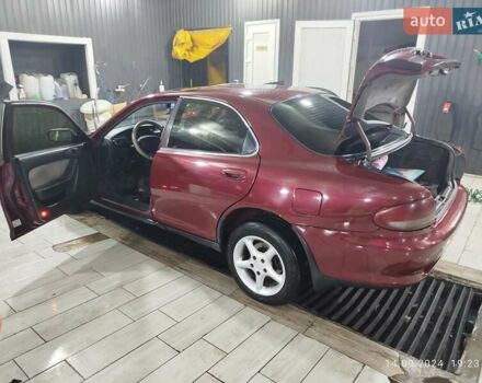 Червоний Мазда Кседос 6, об'ємом двигуна 1.6 л та пробігом 265 тис. км за 2500 $, фото 9 на Automoto.ua