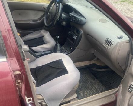 Красный Мазда Кседос 6, объемом двигателя 2 л и пробегом 350 тыс. км за 1200 $, фото 2 на Automoto.ua