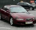 Красный Мазда Кседос 6, объемом двигателя 2 л и пробегом 299 тыс. км за 1100 $, фото 1 на Automoto.ua