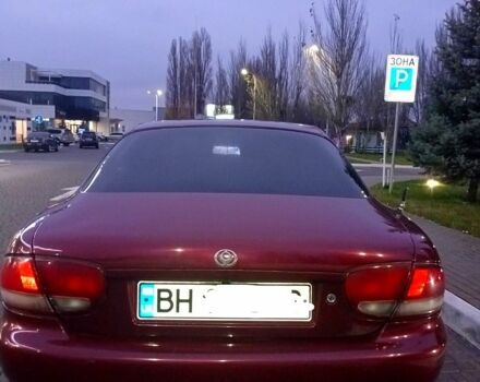 Красный Мазда Кседос 6, объемом двигателя 1.6 л и пробегом 265 тыс. км за 2500 $, фото 2 на Automoto.ua