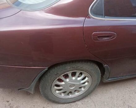 Червоний Мазда Кседос 6, об'ємом двигуна 2 л та пробігом 320 тис. км за 1500 $, фото 1 на Automoto.ua
