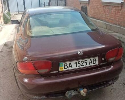 Червоний Мазда Кседос 6, об'ємом двигуна 2 л та пробігом 320 тис. км за 1500 $, фото 3 на Automoto.ua