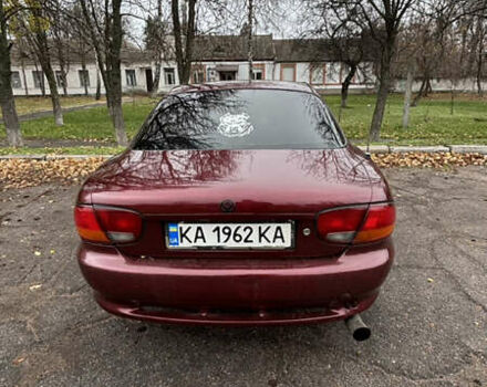 Красный Мазда Кседос 6, объемом двигателя 2 л и пробегом 260 тыс. км за 2800 $, фото 3 на Automoto.ua