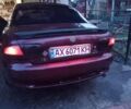 Червоний Мазда Кседос 6, об'ємом двигуна 2 л та пробігом 280 тис. км за 2800 $, фото 1 на Automoto.ua