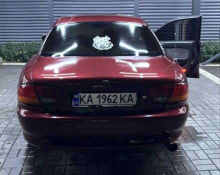 Красный Мазда Кседос 6, объемом двигателя 2 л и пробегом 240 тыс. км за 2800 $, фото 1 на Automoto.ua