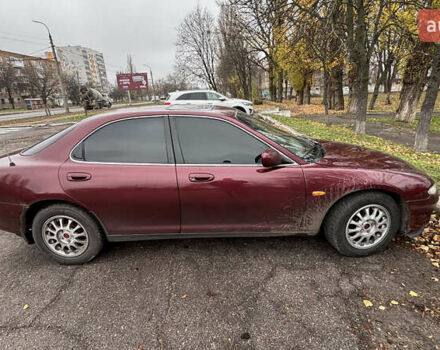 Красный Мазда Кседос 6, объемом двигателя 2 л и пробегом 260 тыс. км за 2800 $, фото 1 на Automoto.ua