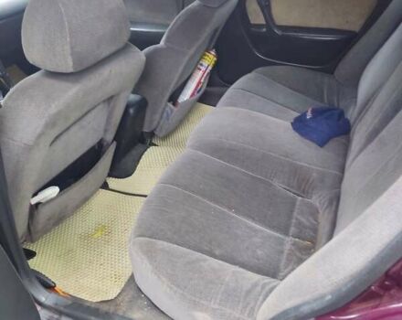 Червоний Мазда Кседос 6, об'ємом двигуна 2 л та пробігом 280 тис. км за 2900 $, фото 2 на Automoto.ua