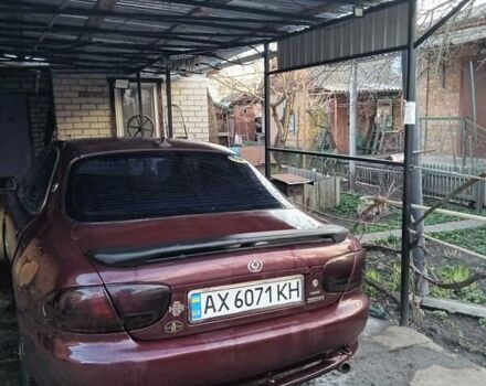 Красный Мазда Кседос 6, объемом двигателя 2 л и пробегом 280 тыс. км за 2800 $, фото 7 на Automoto.ua