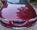 Червоний Мазда Кседос 6, об'ємом двигуна 2 л та пробігом 280 тис. км за 2900 $, фото 1 на Automoto.ua