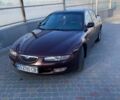 Красный Мазда Кседос 6, объемом двигателя 2 л и пробегом 287 тыс. км за 2900 $, фото 1 на Automoto.ua