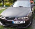 Червоний Мазда Кседос 6, об'ємом двигуна 2 л та пробігом 394 тис. км за 2999 $, фото 1 на Automoto.ua