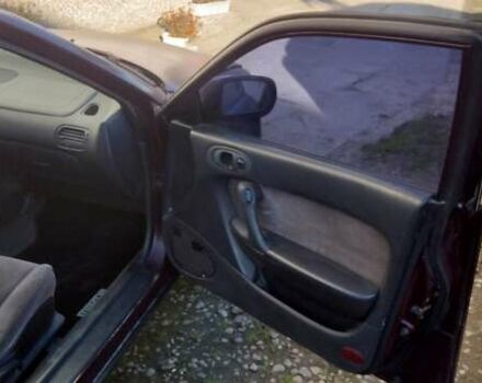 Красный Мазда Кседос 6, объемом двигателя 2 л и пробегом 369 тыс. км за 2000 $, фото 1 на Automoto.ua