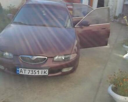 Красный Мазда Кседос 6, объемом двигателя 2 л и пробегом 369 тыс. км за 2000 $, фото 6 на Automoto.ua