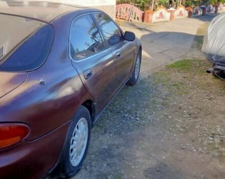 Красный Мазда Кседос 6, объемом двигателя 2 л и пробегом 369 тыс. км за 2000 $, фото 3 на Automoto.ua