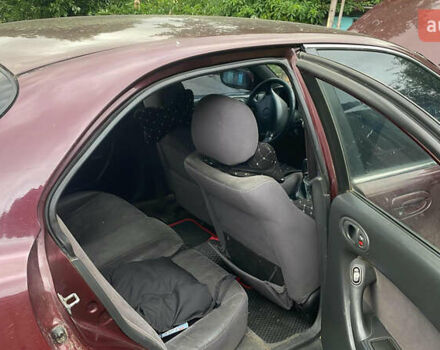 Красный Мазда Кседос 6, объемом двигателя 2 л и пробегом 2 тыс. км за 1800 $, фото 2 на Automoto.ua