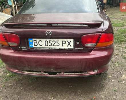 Красный Мазда Кседос 6, объемом двигателя 2 л и пробегом 2 тыс. км за 1800 $, фото 1 на Automoto.ua