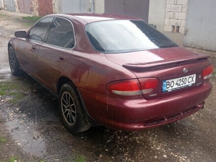 Красный Мазда Кседос 6, объемом двигателя 2 л и пробегом 340 тыс. км за 2000 $, фото 1 на Automoto.ua