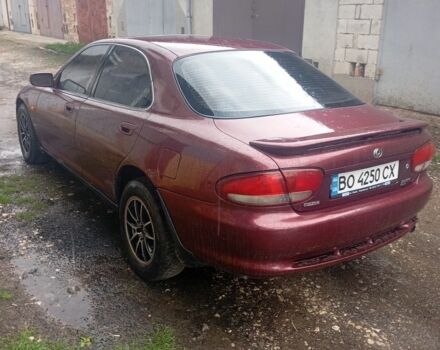 Красный Мазда Кседос 6, объемом двигателя 2 л и пробегом 340 тыс. км за 2000 $, фото 1 на Automoto.ua