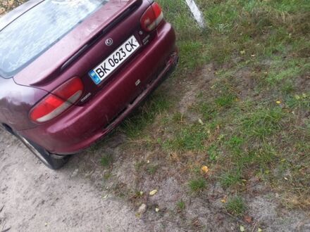 Красный Мазда Кседос 6, объемом двигателя 2 л и пробегом 300 тыс. км за 900 $, фото 1 на Automoto.ua