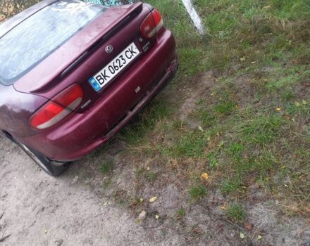 Красный Мазда Кседос 6, объемом двигателя 2 л и пробегом 300 тыс. км за 900 $, фото 1 на Automoto.ua