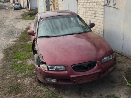 Червоний Мазда Кседос 6, об'ємом двигуна 2 л та пробігом 424 тис. км за 700 $, фото 1 на Automoto.ua