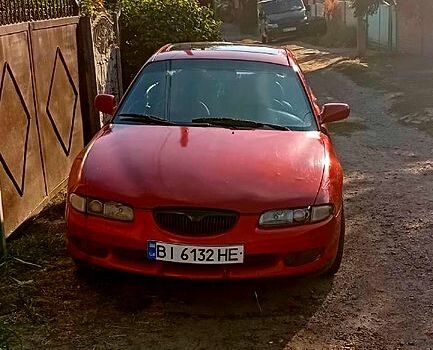 Красный Мазда Кседос 6, объемом двигателя 2 л и пробегом 0 тыс. км за 1500 $, фото 1 на Automoto.ua