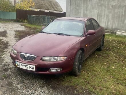 Красный Мазда Кседос 6, объемом двигателя 2 л и пробегом 350 тыс. км за 1200 $, фото 1 на Automoto.ua